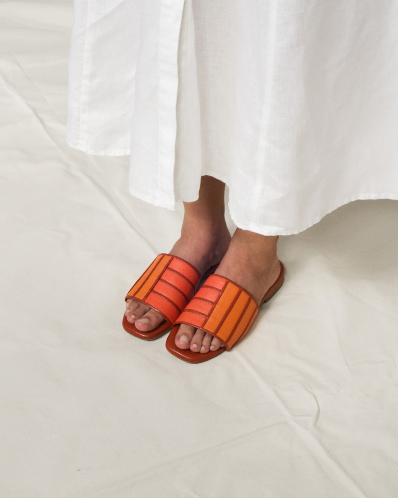 Amara Slide | Oranges